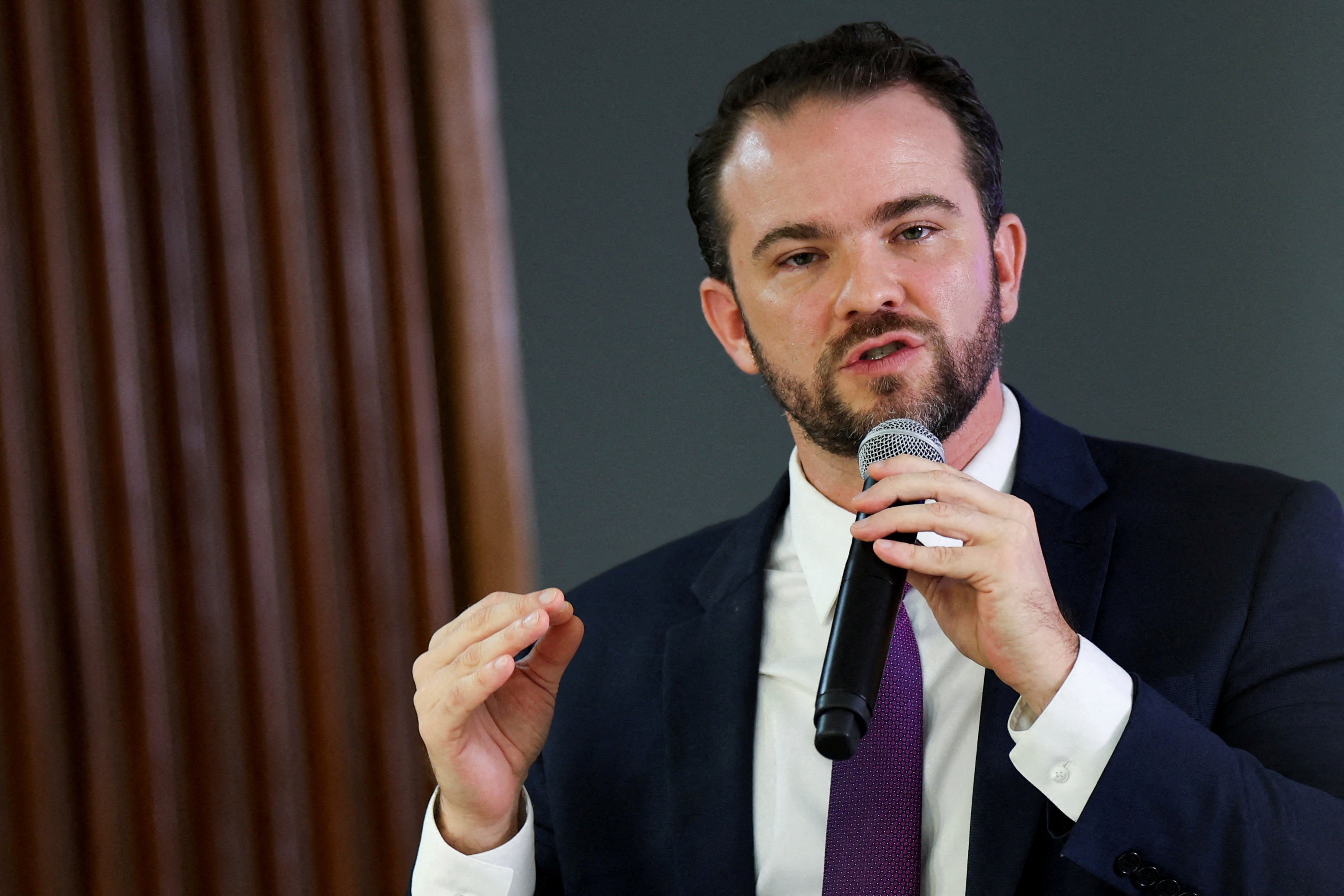 Government weighs allowing workers to tap severance funds to pay debts